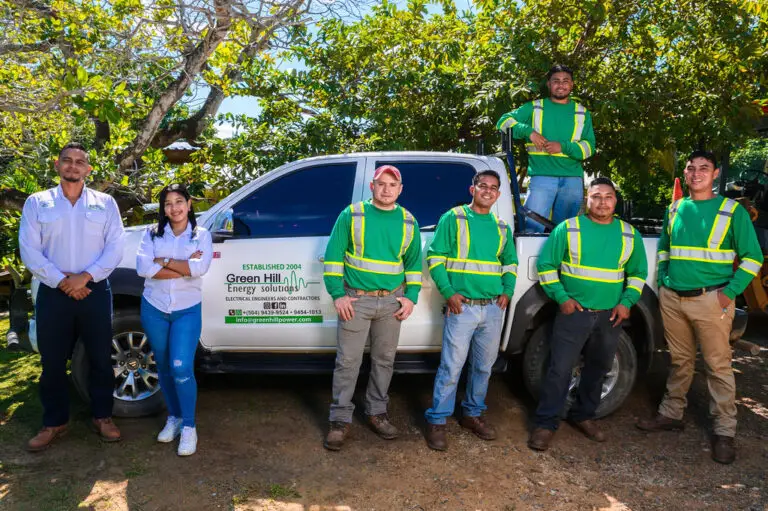 The Green Hill Power team in front of the company truck